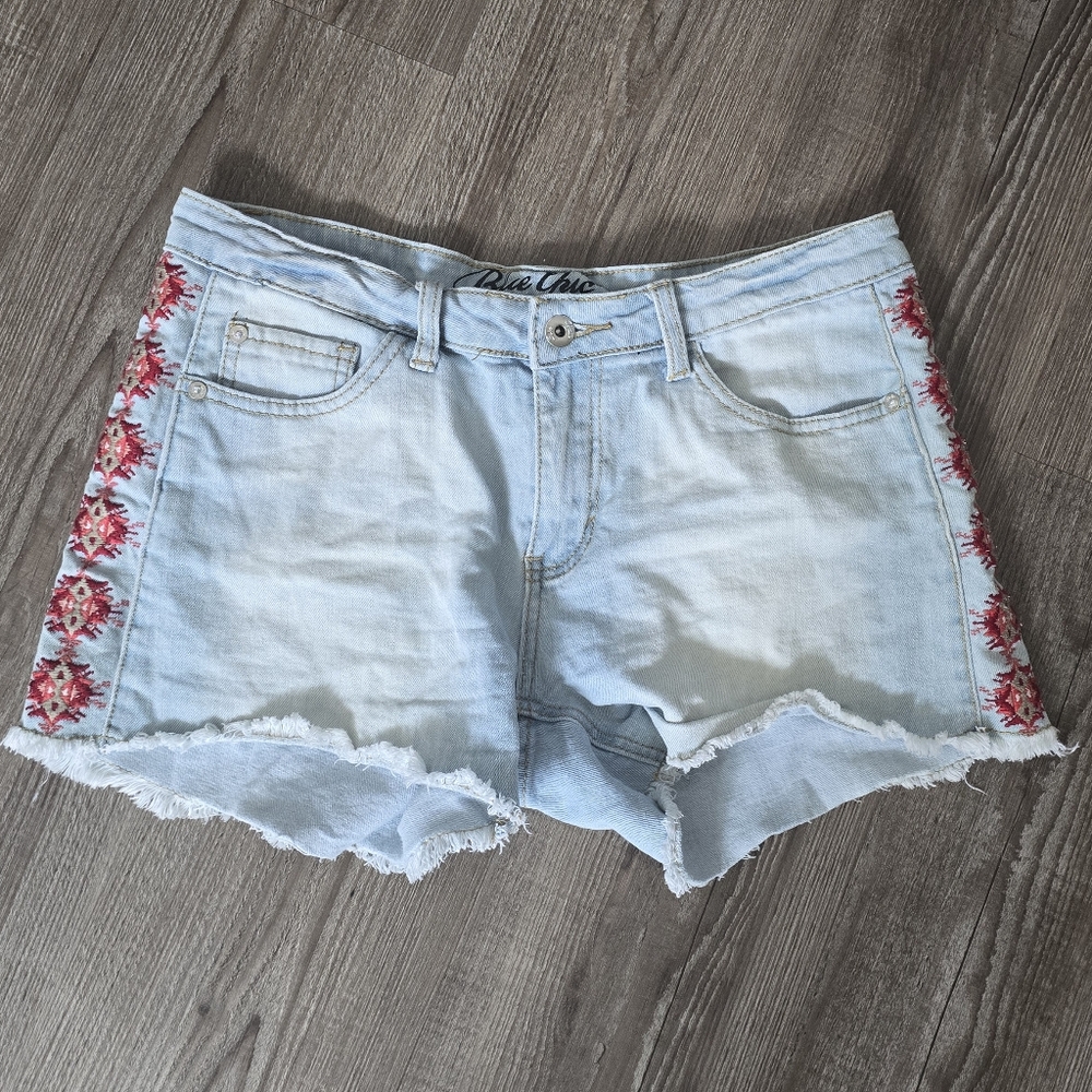 Blue chic blue frayed shorts with red embroidered flowers size 10